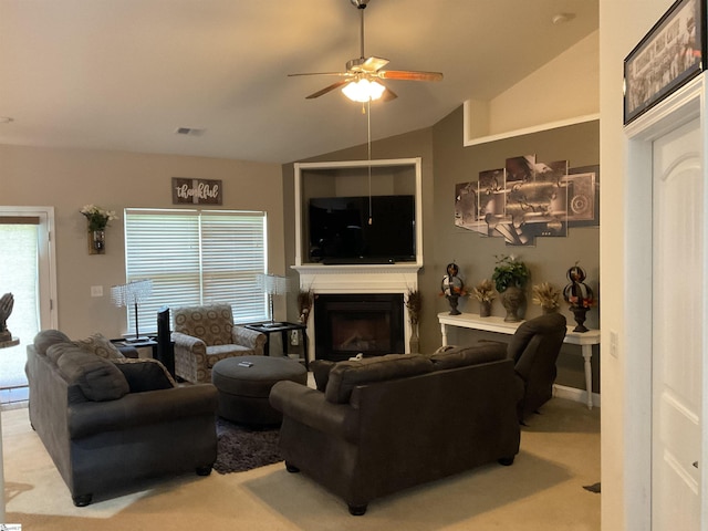 308 Raritan Ct, Simpsonville, SC 29681 - carpeted living room featuring a ceiling fan, lofted ceiling, a fireplace, and plenty of natural light