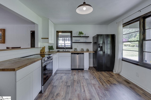 145 Rosewood Cir, Duncan, SC 29334 - kitchen with appliances with stainless steel finishes, wooden counters, and plenty of natural light