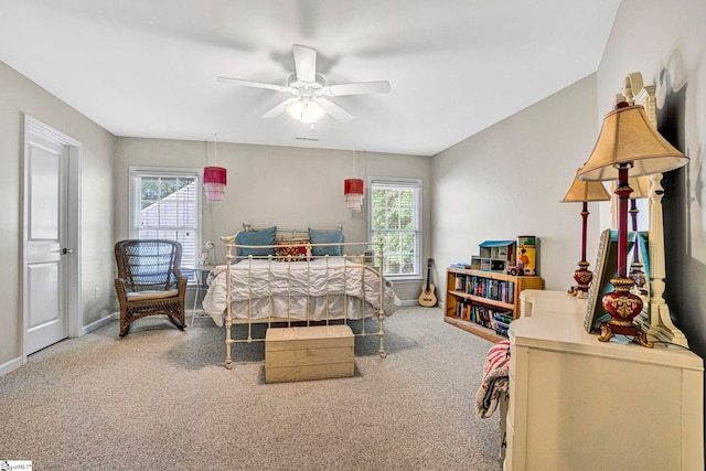 8 Knob Creek Ct, Greer, SC 29651 - carpeted bedroom featuring multiple windows, baseboards, and a ceiling fan