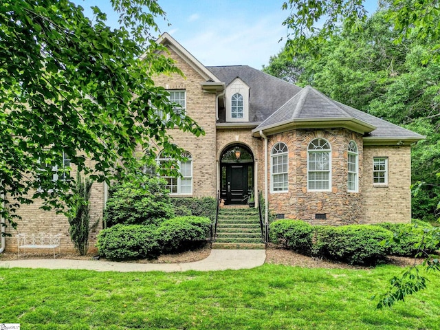 8 Knob Creek Ct, Greer, SC 29651 - view of front of house featuring a front lawn, stone siding, brick siding, and roof with shingles