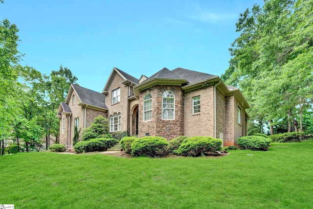 8 Knob Creek Ct, Greer, SC 29651 - colonial house with brick siding and a front yard
