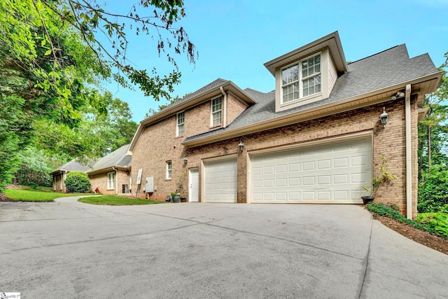 8 Knob Creek Ct, Greer, SC 29651 - view of front facade with driveway, brick siding, and a shingled roof