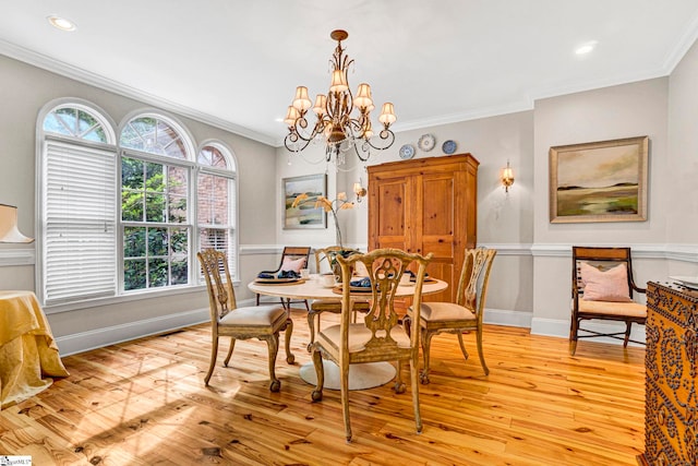 8 Knob Creek Ct, Greer, SC 29651 - dining space with light wood-style flooring, a chandelier, healthy amount of natural light, crown molding, and baseboards