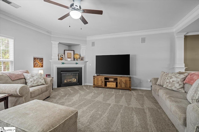 3 Clifford Ct, Simpsonville, SC 29681 - carpeted living room with ornate columns, crown molding, ceiling fan, a glass covered fireplace, and baseboards