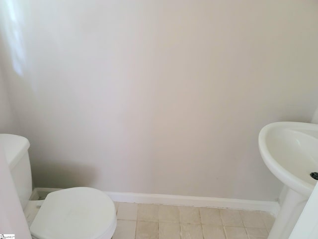 200 Lincoln Dr, Gaffney, SC 29341 - half bathroom featuring baseboards, toilet, and tile patterned floors