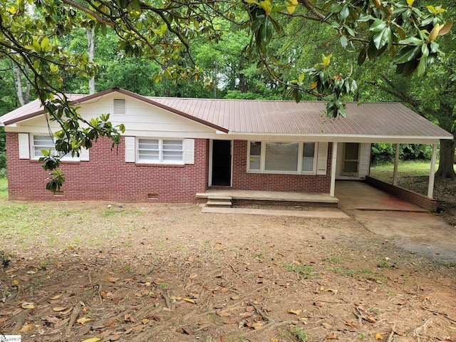 200 Lincoln Dr, Gaffney, SC 29341 - ranch-style home with an attached carport, metal roof, crawl space, covered porch, and brick siding