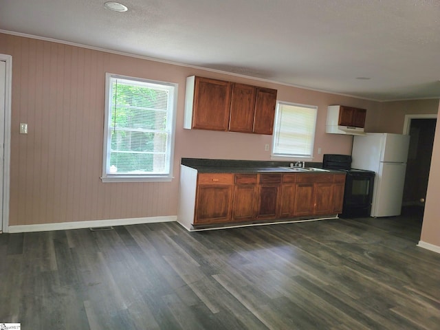 200 Lincoln Dr, Gaffney, SC 29341 - kitchen featuring black range with electric cooktop, freestanding refrigerator, dark countertops, baseboards, and dark wood-style floors