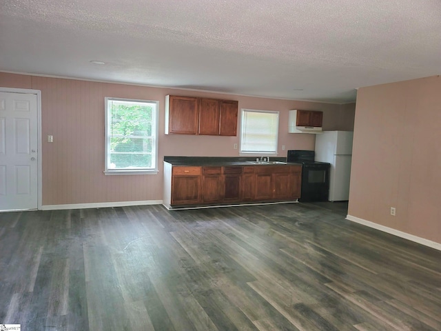 200 Lincoln Dr, Gaffney, SC 29341 - kitchen featuring electric range, freestanding refrigerator, dark countertops, baseboards, and dark wood-style flooring
