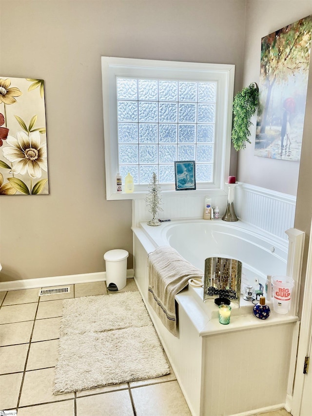 191 Amberwood Dr, Anderson, SC 29621 - bathroom featuring a garden tub, tile patterned floors, and baseboards