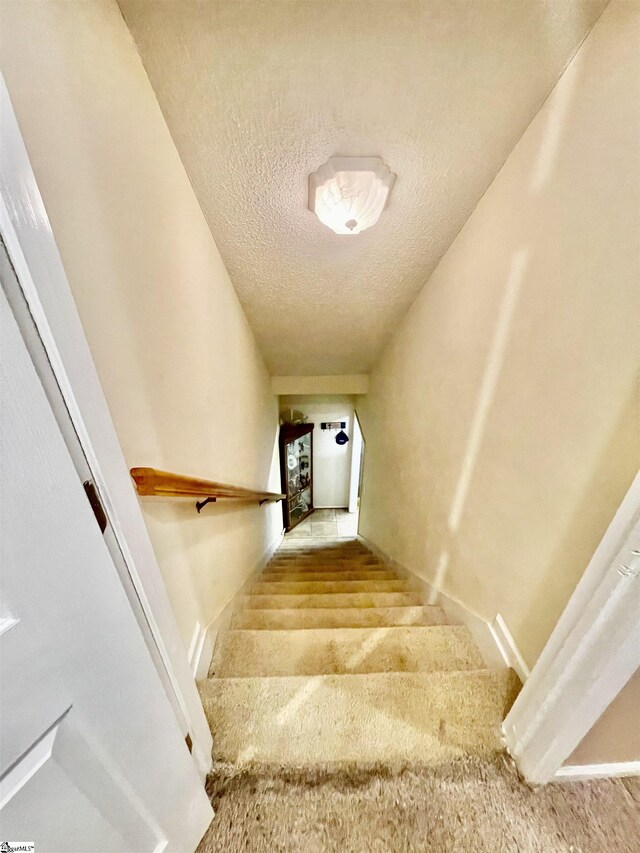 191 Amberwood Dr, Anderson, SC 29621 - stairs with carpet floors and a textured ceiling