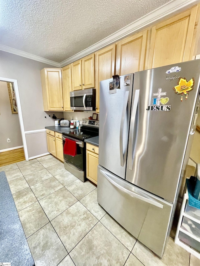 191 Amberwood Dr, Anderson, SC 29621 - kitchen featuring appliances with stainless steel finishes, light brown cabinets, crown molding, dark countertops, and a textured ceiling