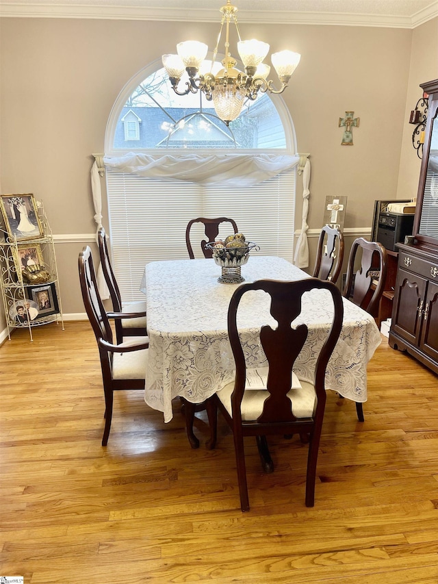 191 Amberwood Dr, Anderson, SC 29621 - dining area with a chandelier, ornamental molding, light wood-style floors, and baseboards