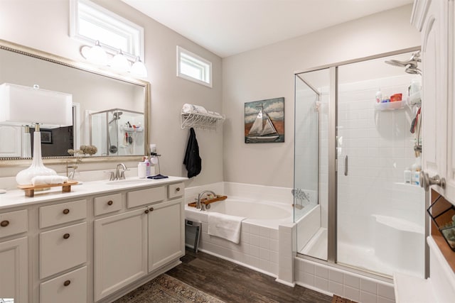 111 Crisp Cameo Ct, Greer, SC 29651 - bathroom featuring a shower stall, a garden tub, vanity, and wood finished floors