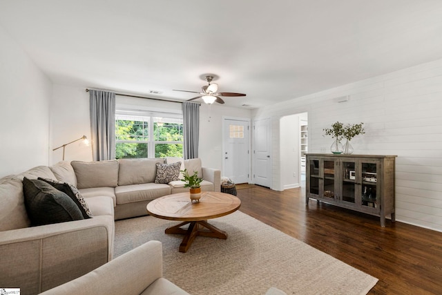 26 Briarcliff Dr, Greenville, SC 29607 - living area with wood finished floors, a ceiling fan, and wooden walls