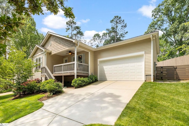 26 Briarcliff Dr, Greenville, SC 29607 - ranch-style home featuring concrete driveway, a ceiling fan, a front yard, an attached garage, and covered porch