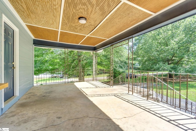 103 Cumbahee Trl, Greenville, SC 29611 - view of patio with an attached carport and view of wooded area