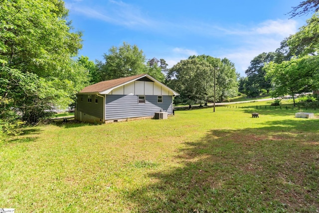 103 Cumbahee Trl, Greenville, SC 29611 - view of green lawn with central AC and view of wooded area