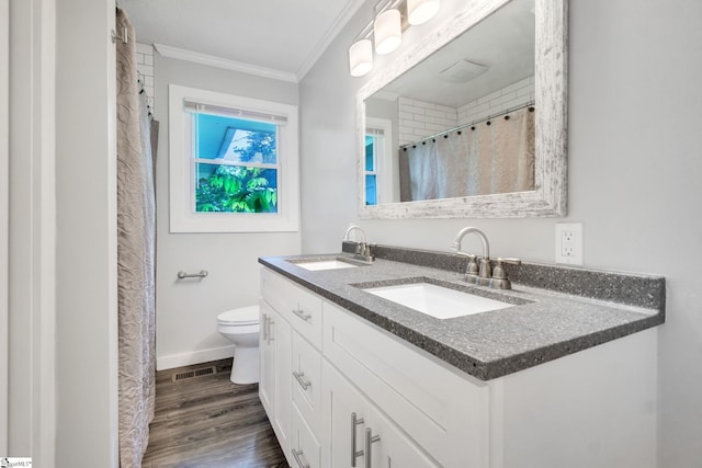 103 Cumbahee Trl, Greenville, SC 29611 - full bath featuring ornamental molding, double vanity, wood finished floors, toilet, and baseboards
