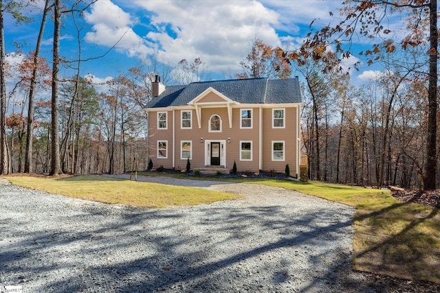 183 Wittmore Ln, Cleveland, SC 29635 - view of front facade featuring a chimney, a front yard, and gravel driveway