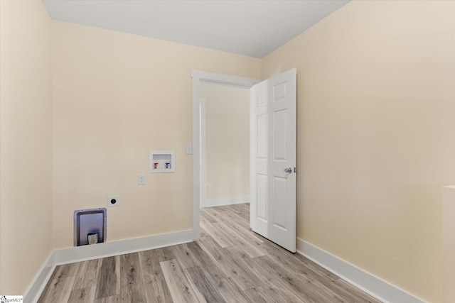 183 Wittmore Ln, Cleveland, SC 29635 - laundry room featuring washer hookup, electric dryer hookup, light wood-type flooring, and baseboards