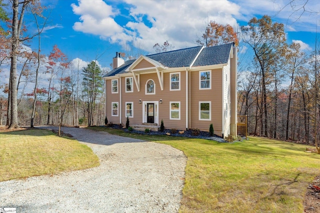 183 Wittmore Ln, Cleveland, SC 29635 - view of front of home featuring a chimney, gravel driveway, and a front lawn