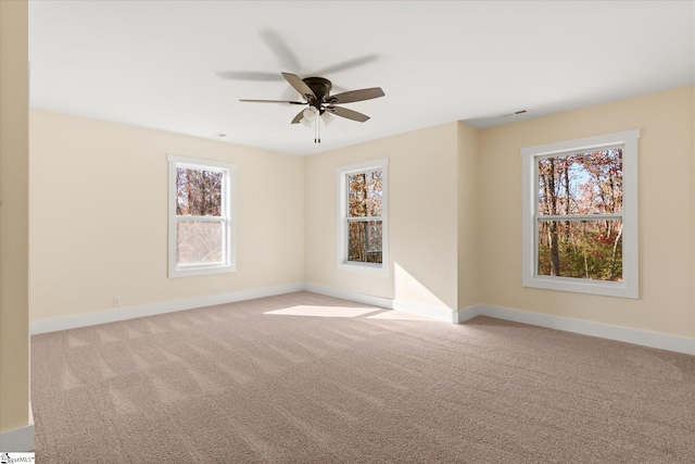 183 Wittmore Ln, Cleveland, SC 29635 - spare room featuring a ceiling fan, light colored carpet, and baseboards