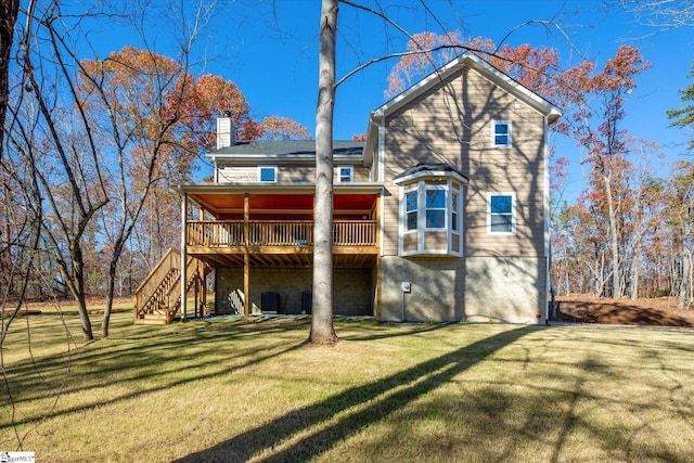 183 Wittmore Ln, Cleveland, SC 29635 - rear view of property featuring a deck, stairs, a chimney, and a yard