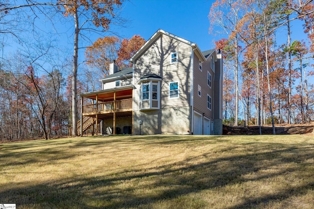 183 Wittmore Ln, Cleveland, SC 29635 - back of house featuring a chimney, stairway, a garage, and a deck