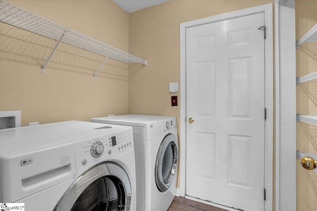 316 Stillwater Dr, Simpsonville, SC 29681 - washroom with independent washer and dryer and wood finished floors
