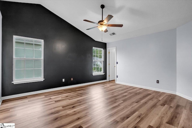 316 Stillwater Dr, Simpsonville, SC 29681 - empty room featuring vaulted ceiling, wood finished floors, ceiling fan, and baseboards