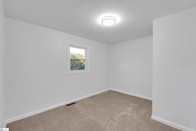 402 Laurel And Hardy Lake Rd, Marietta, SC 29661 - unfurnished room with carpet flooring and baseboards