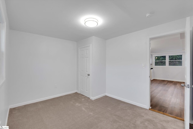 402 Laurel And Hardy Lake Rd, Marietta, SC 29661 - carpeted spare room featuring baseboards and a smoke detector