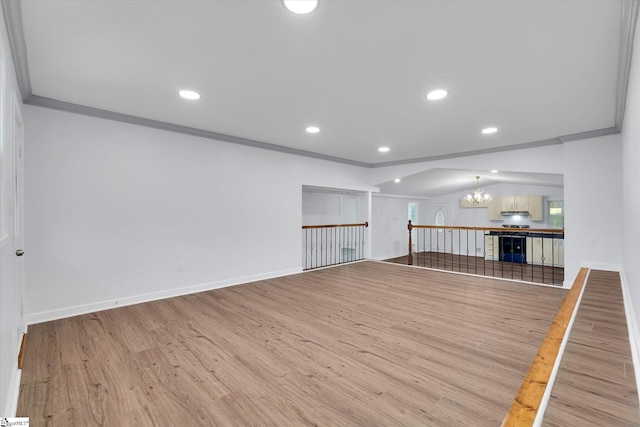 402 Laurel And Hardy Lake Rd, Marietta, SC 29661 - empty room featuring a chandelier, wood finished floors, crown molding, baseboards, and recessed lighting