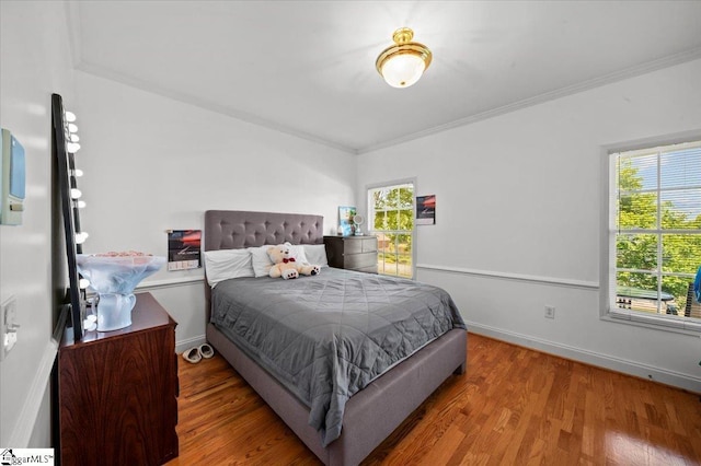 123 S Lake Emory Dr, Inman, SC 29349 - bedroom featuring wood finished floors, ornamental molding, and baseboards