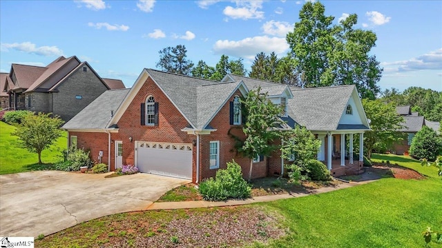 123 S Lake Emory Dr, Inman, SC 29349 - traditional home featuring a garage, brick siding, driveway, a front lawn, and a shingled roof