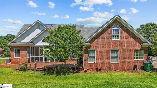 123 S Lake Emory Dr, Inman, SC 29349 - view of front of property with brick siding, central air condition unit, a wooden deck, and a front yard