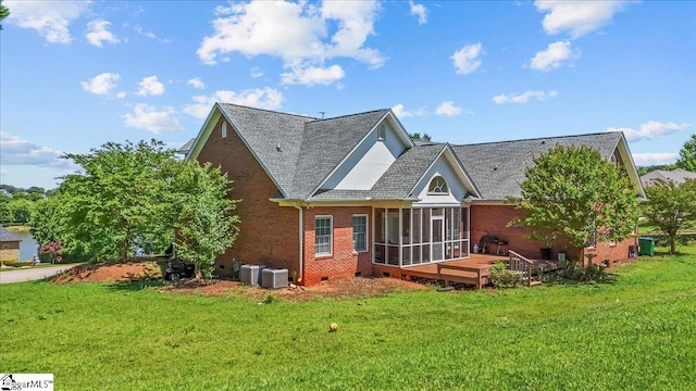 123 S Lake Emory Dr, Inman, SC 29349 - rear view of house with brick siding, a sunroom, a lawn, and a deck