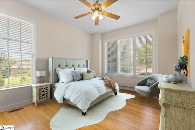 404 N Tidewater Trl, Inman, SC 29349 - bedroom with light wood finished floors, baseboards, and a ceiling fan