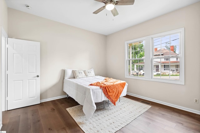 1316 E S 6th St, Seneca, SC 29678 - bedroom with baseboards, wood finished floors, and ceiling fan