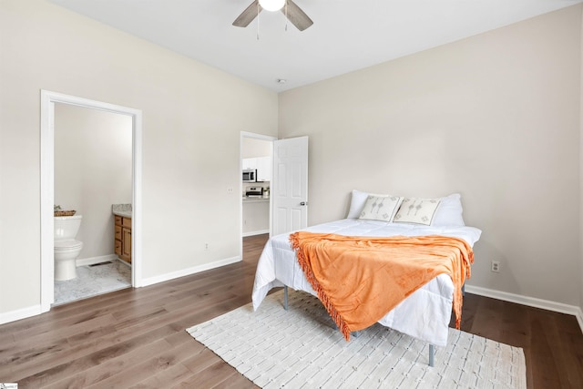 1316 E S 6th St, Seneca, SC 29678 - bedroom with wood finished floors, ensuite bath, baseboards, and ceiling fan