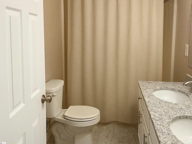 1316 E S 6th St, Seneca, SC 29678 - full bath with toilet, marble finish floors, and double vanity