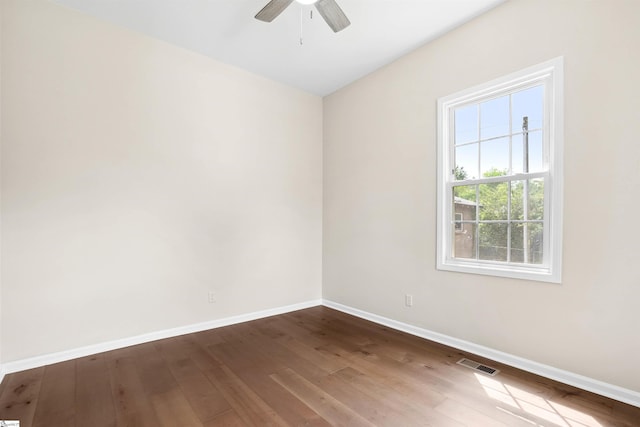 1316 E S 6th St, Seneca, SC 29678 - unfurnished room featuring baseboards, a ceiling fan, and dark wood-type flooring