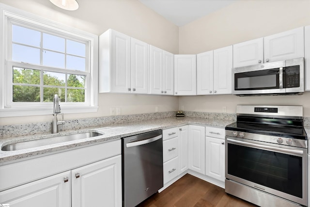 1316 E S 6th St, Seneca, SC 29678 - kitchen featuring stainless steel appliances, a sink, white cabinets, and dark wood finished floors