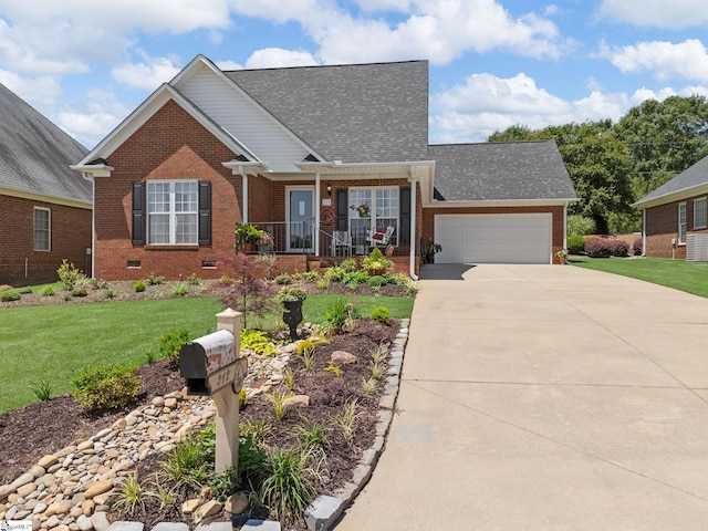 312 Terrace Hills Dr, Boiling Springs, SC 29316 - view of front facade with brick siding, concrete driveway, an attached garage, and a front lawn