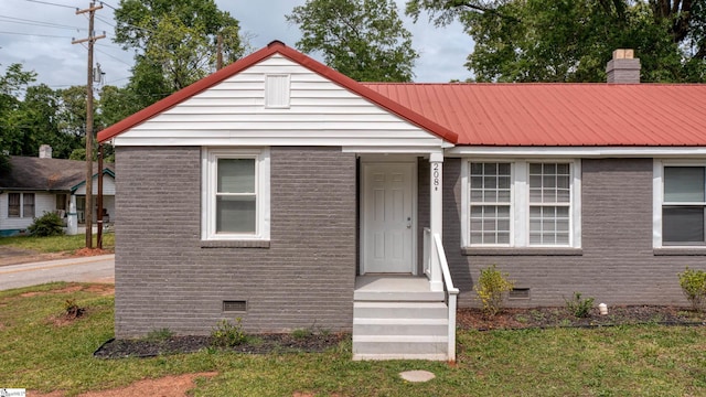 208 Arlington Avenue Unit A And B, Anderson, SC 29621 - bungalow-style house featuring crawl space, brick siding, a front yard, and metal roof