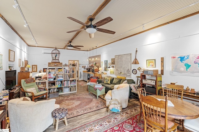 298 Stamey Valley Rd, Travelers Rest, SC 29690 - living area featuring a ceiling fan, rail lighting, wood finished floors, and a wall unit AC