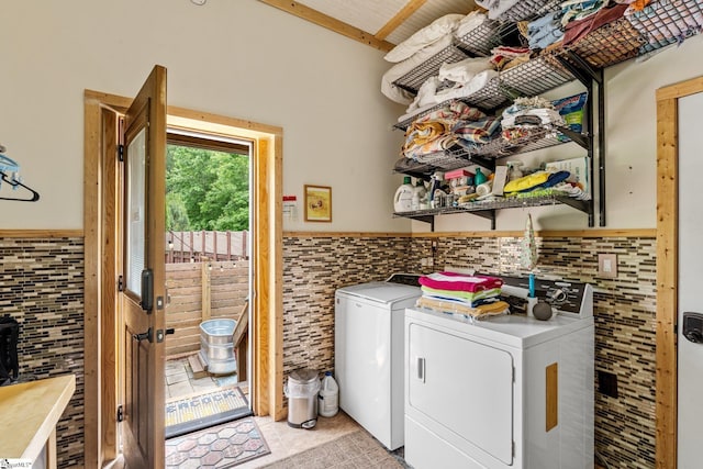 298 Stamey Valley Rd, Travelers Rest, SC 29690 - washroom featuring separate washer and dryer, tile walls, wainscoting, and light tile patterned floors