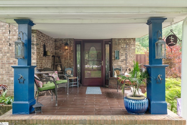 298 Stamey Valley Rd, Travelers Rest, SC 29690 - doorway to property with covered porch and brick siding