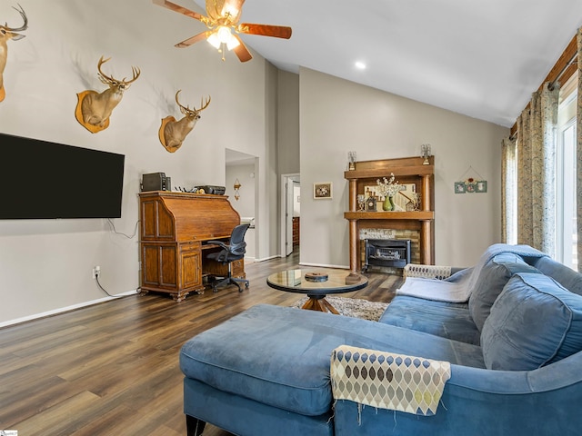 112 Scruggs Ln, Gaffney, SC 29341 - living area featuring a glass covered fireplace, a ceiling fan, dark wood-style flooring, and high vaulted ceiling