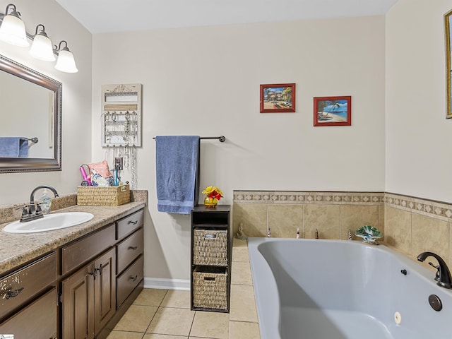 112 Scruggs Ln, Gaffney, SC 29341 - bathroom featuring vanity, a jetted tub, and tile patterned flooring